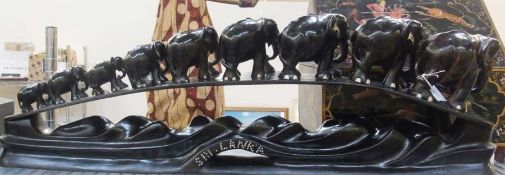 Set of graduated ebony Elephants marked "Sri Lanka"