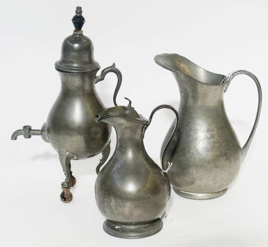 Dutch pewter chocolate pot, with ebonised finial, raised domed cover, scroll handle, the baluster