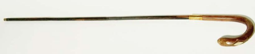 Malacca wood and brass sword stick, with curved handle