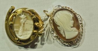 Gilt metal surround cameo brooch, depicting a figure outside a house and a 9ct gold framed oval