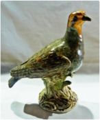 Meissen model of a partridge, blue cross marks to base and marked 2475, 22cm high