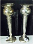 Pair George V silver flower vases, with wavy edged rim, globular bowl, raised on tapering