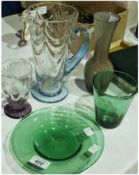 Blue glass jug, four amethyst tumblers, two green glass tumblers and two other pieces (9)