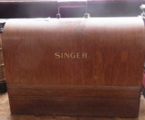 Singer sewing machine, within a wooden case