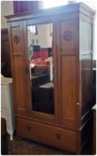 20th century oak wardrobe with mirrored single door, with carved panels, with single long drawer