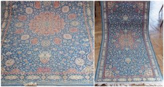 Wilton wool rug in Persian style, all-over floral decorated and a matching, smaller, rug