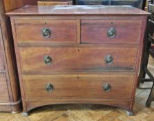 Early twentieth century walnut chest of two short and three long graduated drawers with Arts and