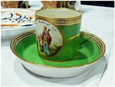 Vienna porcelain cabinet cup and saucer, the cylindrical cup painted with oval medallion with