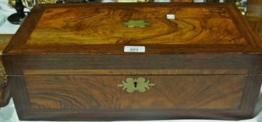 A Victorian walnut and rosewood writing box with baize lined writing slope and fitted interior,