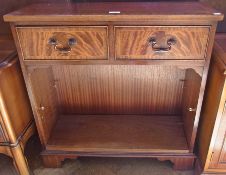 A reproduction mahogany side cabinet, with two frieze drawers and adjustable open shelf below raised