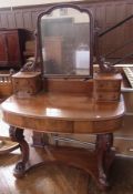 Victorian mahogany dressing table with triple arch rectangular mirror, on foliate scroll supports,