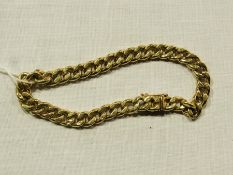 18ct curb link bracelet, the clasp marked 750, with safety keep