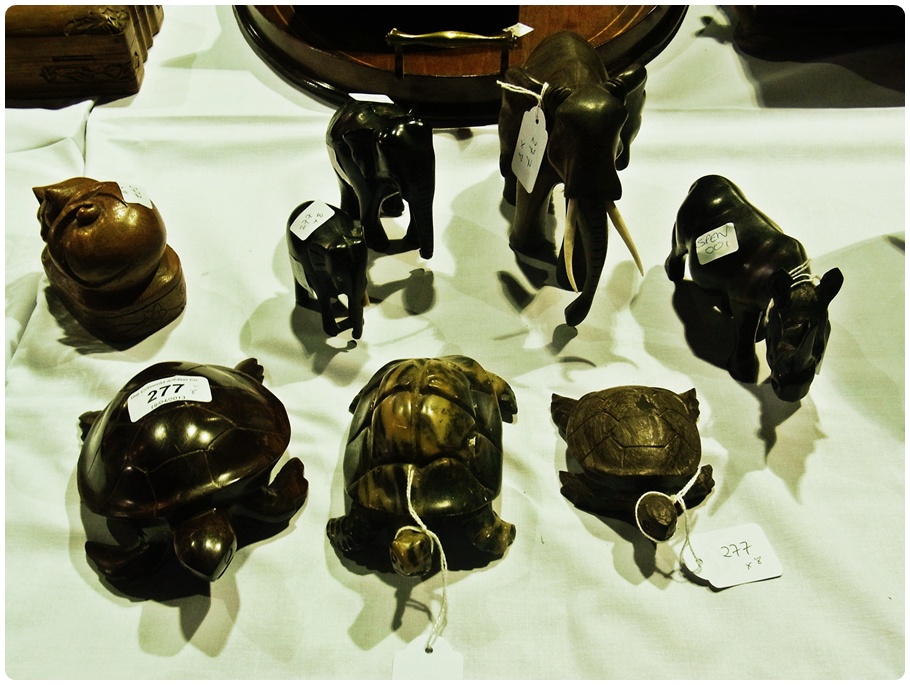 Various carved wooden African animals to include rhino, elephants, tortoises etc. (8)