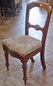 Set of four 20th century Victorian style chairs with overstuffed seat covers, carved serpentine seat