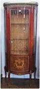 Louis XV style mahogany and gilt metal mounted display cabinet, bowfronted with serpentine sides,