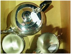 Silverplate tea service, comprising teapot, sugar bowl and cream jug, made by Garrard, in original