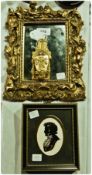 A gilt composition framed rectangular wall mirror, with putti and foliate design, the plate 16 x