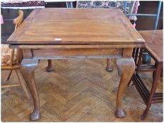 A 20th century mahogany drawleaf dining table, raised on cabriole legs with pad feet, 90cm wide