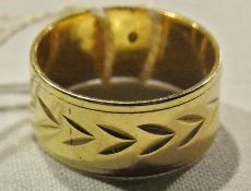 Gold-coloured metal ring, with bright cut engraving