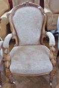 Victorian carved walnut lady's and gentleman's armchair and balloonback sewing chair with carved