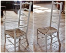Set of four white painted rush seated chairs (3 singles, 1 carver)