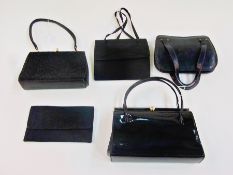 A collection of vintage handbags including:- three black evening bags, black patent leather bag