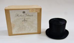 A silk top hat "Hill House and Co, New Bond Street, London", in a Herbert Johnson cardboard hat box,