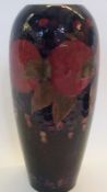 Moorcroft pottery vase, tall ovoid, "Pomegranate" pattern with frieze of fruit on a dark blue