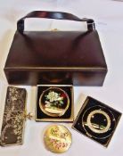 Three Stratton compacts ( 2 in original boxes), a black leather handbag by Ackery and a small