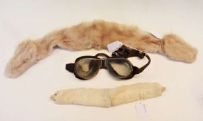 A small fur tippet, a small piece of ermine, and a pair of driving goggles (1 box)