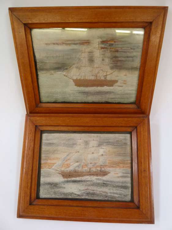 Pair of 19th century silk embroideries showing ships in full sail, with some painted editions,