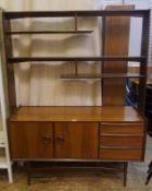 1960's/70's mahogany and teak sideboard with asymmetric open shelved upper section, cupboard below