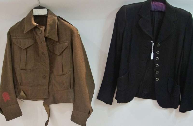 A small army battledress jacket, labelled "Home Guard MX3", a black wool jacket with blue and
