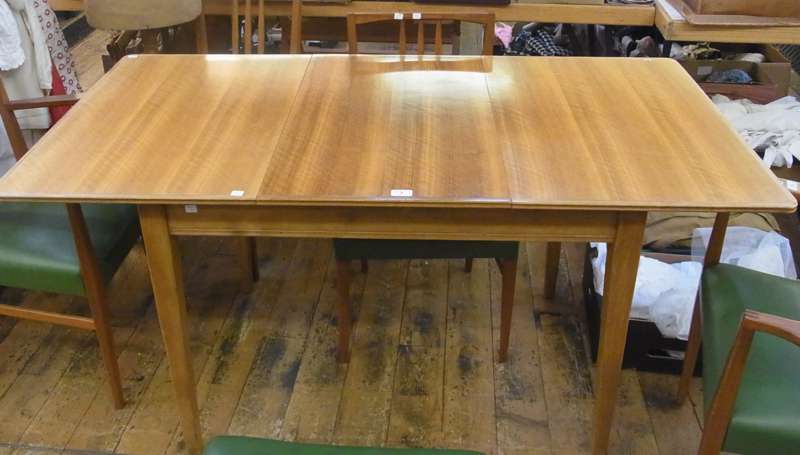 1970's Gordon Russell walnut veneer and hardwood extending dining table, on tapering supports, 153cm