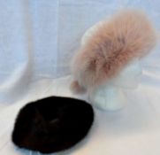 A cream leather and pale pink fox fur cap with two bobbles together with a mink hat (2)