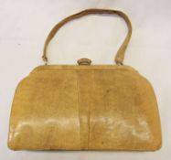 A Mappin and Webb fixed frame lizard skin vintage handbag, light tan in colour