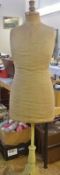 A dressmakers dummy on adjustable stand, No 42