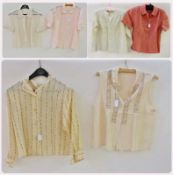 A selection of vintage blouses including:- 1950's nylon lace blouse (9)