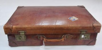 A large vintage leather suitcase, trimmed inside with crocodile, made by "R.W. Forsyth, Edinburgh,