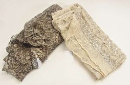 An eastern cream stole with silver metal decorations along with a lace shawl of silvered thread (2)