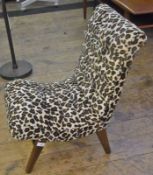 Pair 1960's 'slipper' chairs recovered in leopard print