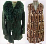 A 1970's green sheepskin coat with mongolian lamb collar and cuffs, and a vintage long fur