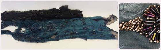 A remnant of a 1920's dress, embroidered on blue net, bugle beads, sequins, silver coloured beads