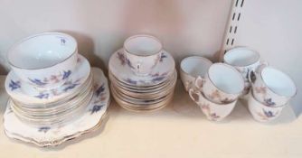 Royal Albert part tea service, bluebird design with petal blossom on a white ground with gilt