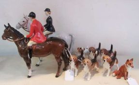 Beswick pottery huntsman on bay horse, wearing red jacket, the horse with flat flash and front socks