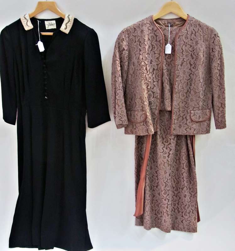 A black crepe "Peg Palmer" cocktail dress, with collar with faux pearls, a brown lace dress with
