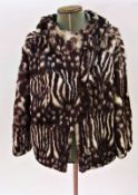 A 1970's 'fun fur' , rabbit dyed black and white with a hood