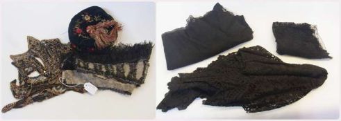 Various lengths of black lace, possibly mantillas, an embroidered velvet smoking cap, lace beaded