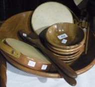 A large turned wooden salad bowl, with servers, inlaid cribbage board, wooden bowls and a pair