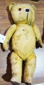 Gold plush teddy bear, with stitched snout